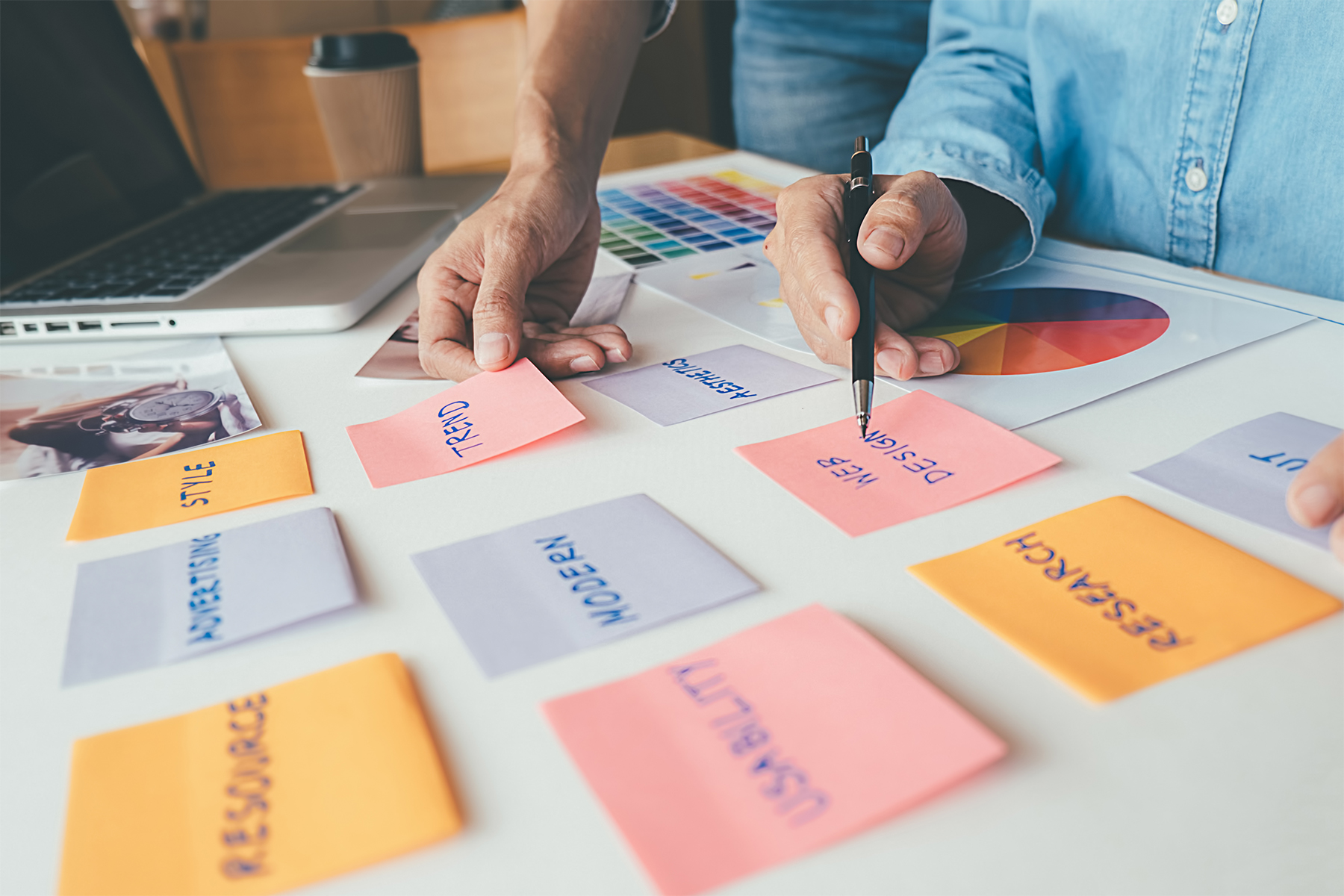 Designer woman drawing a website outline and website ux app deve